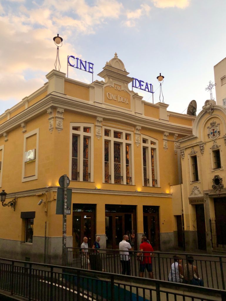 The yellow facade of "Cine Ideal" in Madrid.