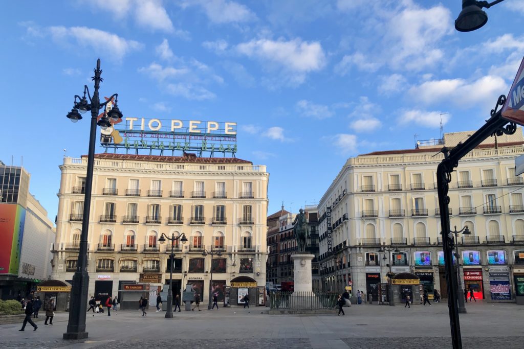 La Puerta del Sol in Madrid, with the famous Tío Pepe neon sign.