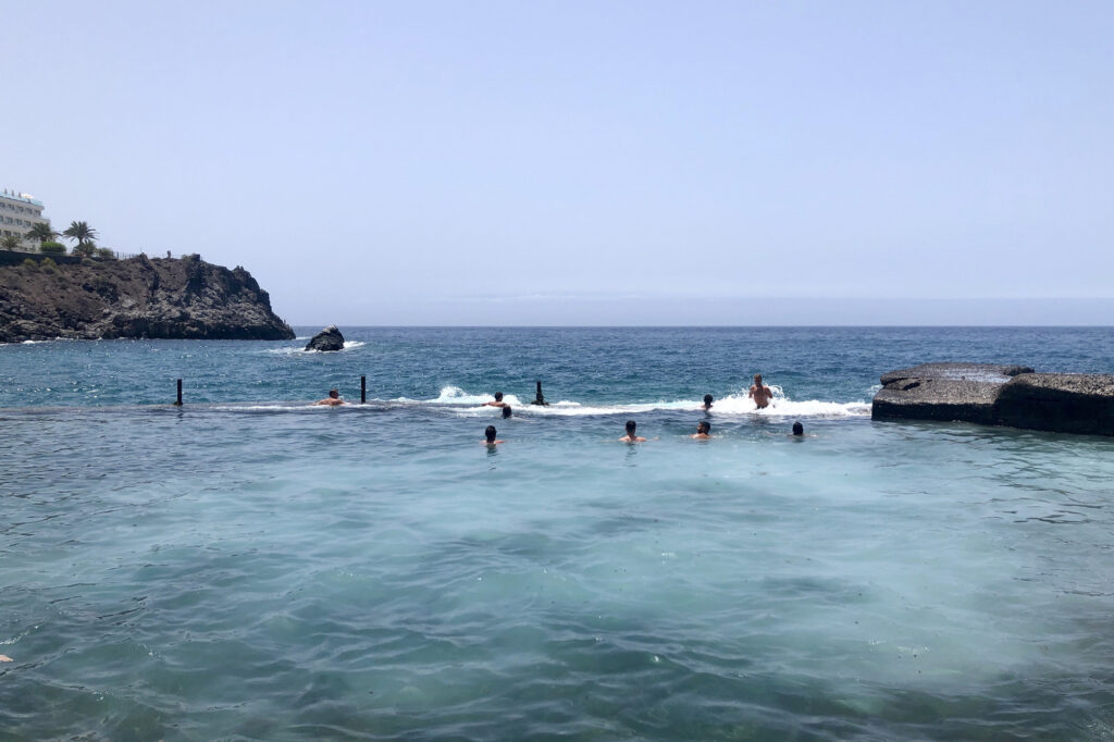 A natural pool blends into the sea in Tenerife.
